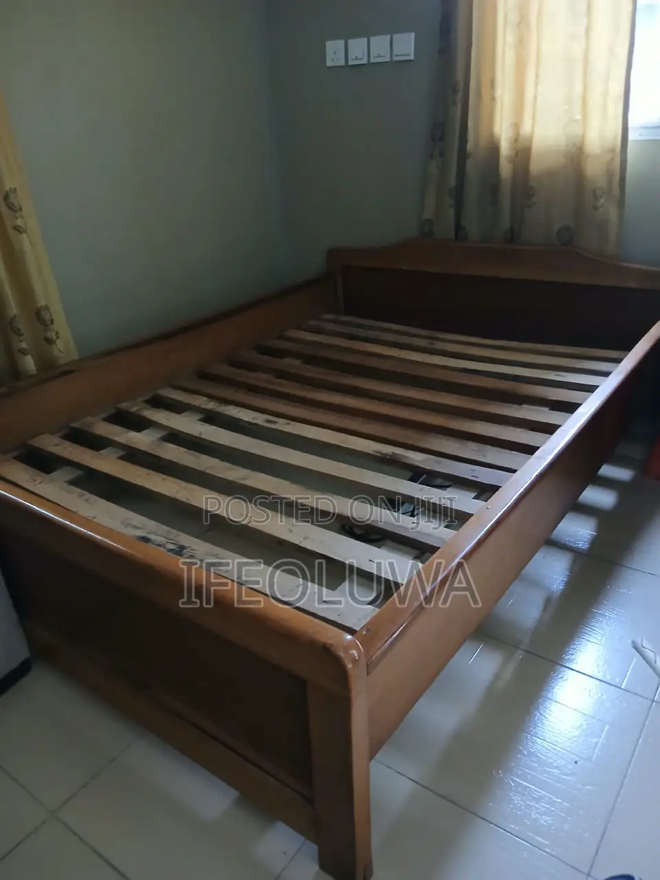 A Wooden 4 by 6 Bedframe