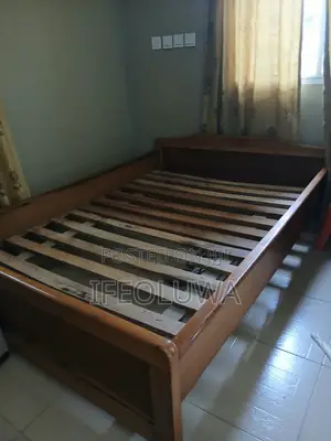 A Wooden 4 by 6 Bedframe