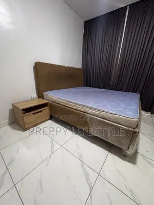 Neatly Used Bed Frame and Semi Orthopedic Mattress 6by7