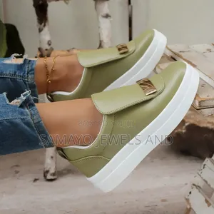 Women’s Black and White Platform Slip-on Sneakers