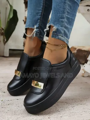 Women’s Black and White Platform Slip-on Sneakers