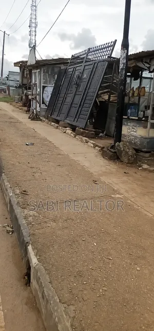 One & Half Corner Piece of Land With CofO Facing Ishefun Road Ayobo