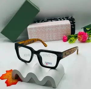 Black Rectangular Tommy Jeans Glasses Featuring Bold Branding