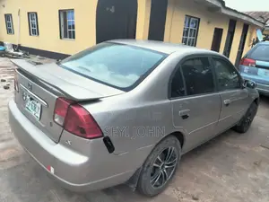 Honda Civic DX 2dr Coupe (1.7L 4cyl 4A) 2002 Gold