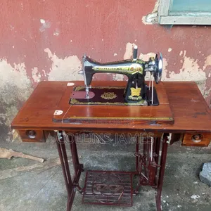 Vintage Butterfly Treadle Sewing Machine With Cabinet Table