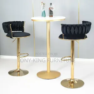 Modern Pedestal Bar Set Featuring a Round White Faux-Marble Tabletop.