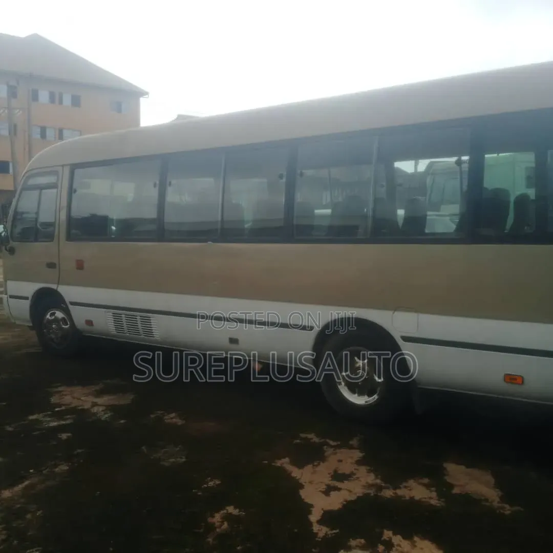 Toyota Coaster 2022 Gold