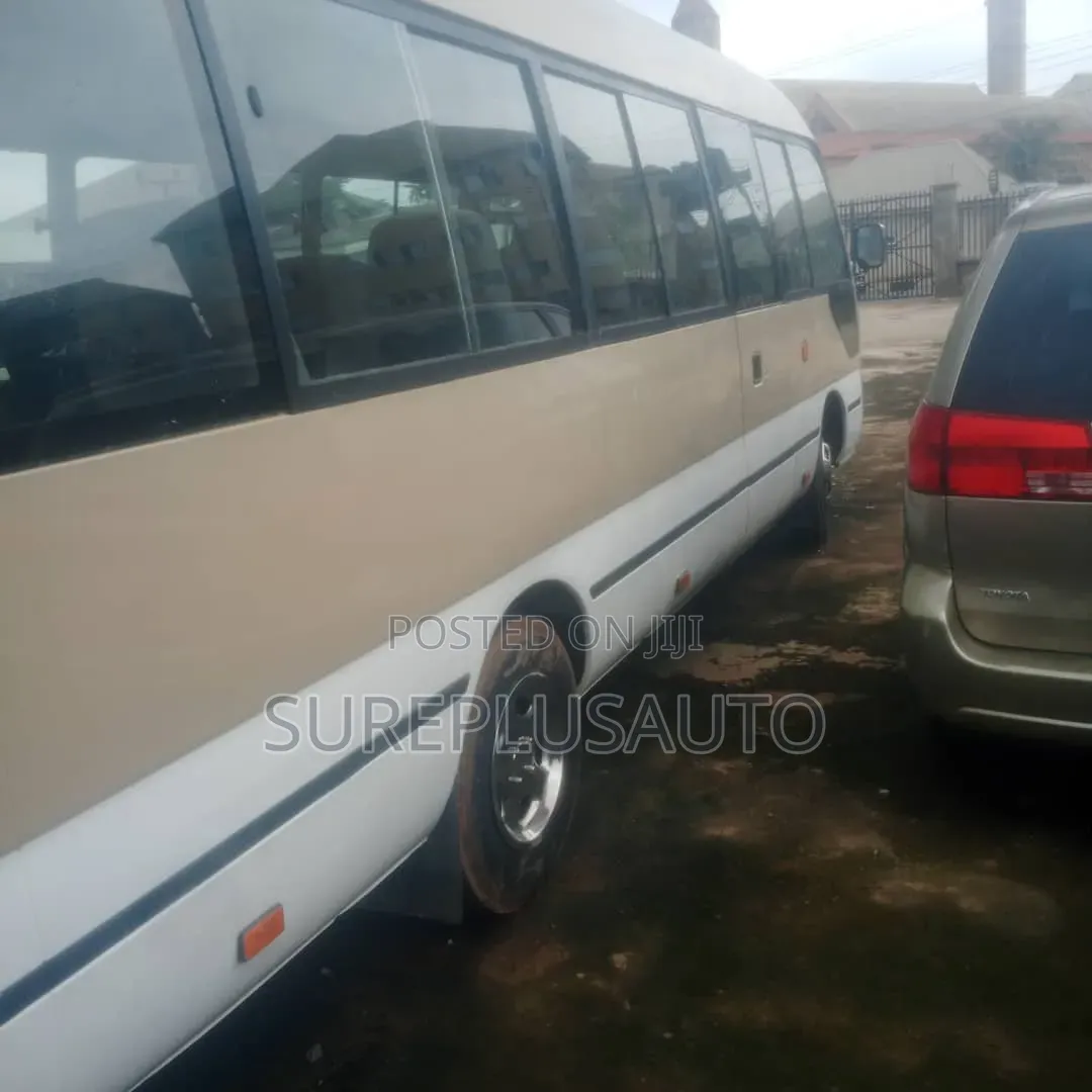 Toyota Coaster 2022 Gold