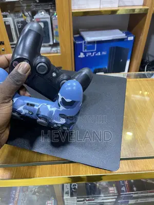 Uk Clean Used Ps4 Console (With Two Pads)