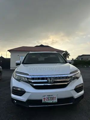 Honda Pilot Touring 4dr SUV 4WD (3.5L 6cyl 9A) 2017 White