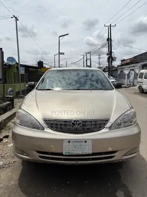 Toyota Camry SE V6 4dr Sedan (3.0L 6cyl 4A) 2003 Gold