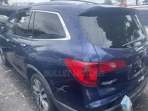 Honda Pilot Touring 4dr SUV 4WD (3.5L 6cyl 9A) 2017 Blue