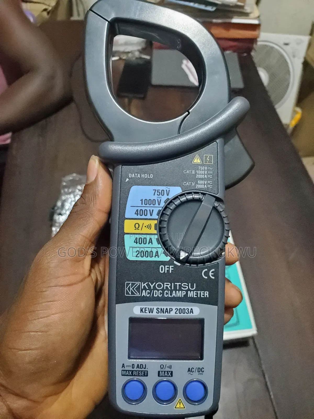 A Kyoritsu AC/DC Digital Clamp Meter.