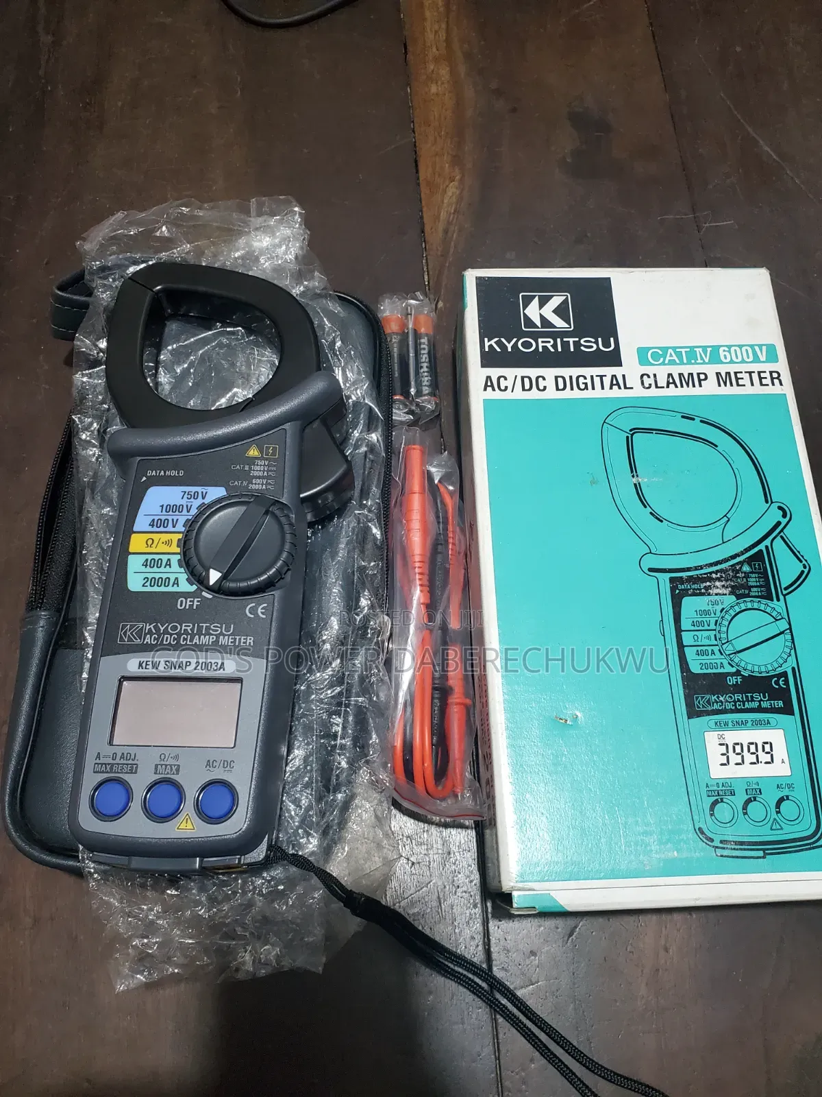 A Kyoritsu AC/DC Digital Clamp Meter.