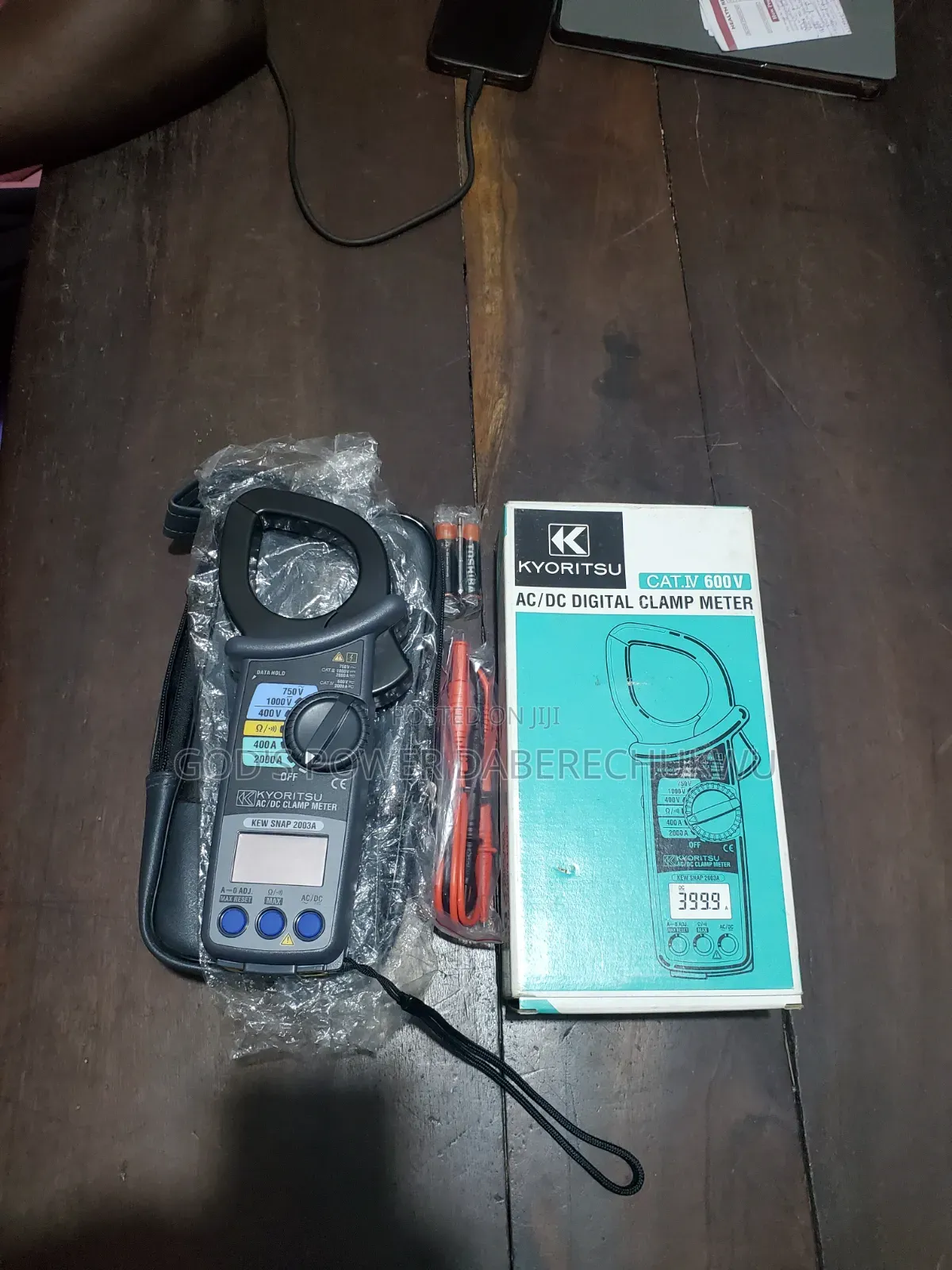 A Kyoritsu AC/DC Digital Clamp Meter.