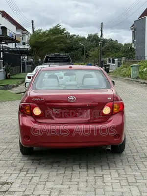Toyota Corolla LE 4dr Sedan (1.8L 4cyl 4A) 2010 Red