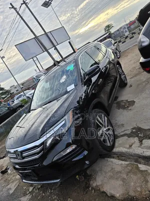 Honda Pilot Touring 4dr SUV 4WD (3.5L 6cyl 9A) 2016 Black