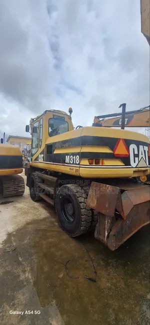 Caterpillar Wheel Excavator M318 for Sale. Price: 150Million