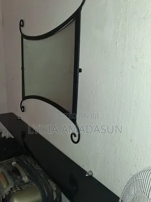 A Decore Mirror and a Wall Rack