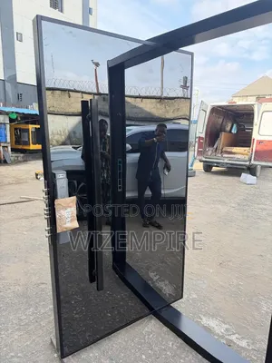 Plain Black Pivot Door With Smart Lock Handle Available