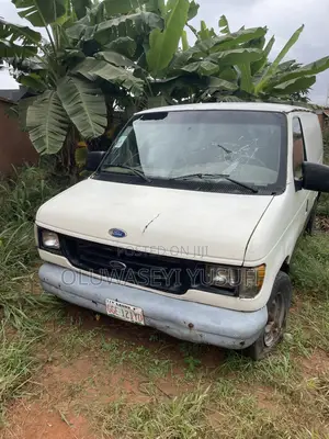 Ford E250 1995 White