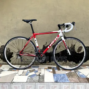 Sharp Red Trek Light 9-Speed Road Bike With Carbon Fork & Bearing Rims