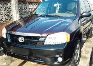 Mazda Tribute 3.0 DX 2001 Maroon