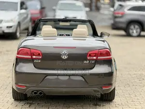 Volkswagen Eos Sport 2dr Convertible (2.0L 4cyl Turbo 6AM) 2014 Brown