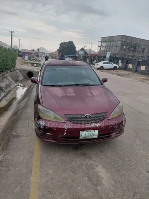 Toyota Camry LE 4dr Sedan (2.4L 4cyl 5M) 2003 Red