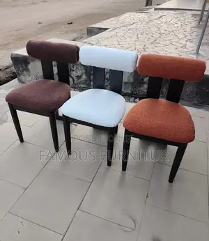 This Contemporary Dining Chair Features a Striking Dark Wood Frame Pai
