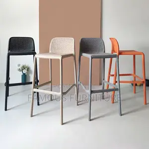 Perforated Plastic Bar Stools Featuring a Stylish Dotted Pattern