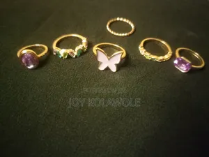 Trendy Knuckle Rings, Gold With Purple and Different Stone Color