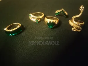 Trendy Knuckle Rings, Gold With Emerald Stone Color