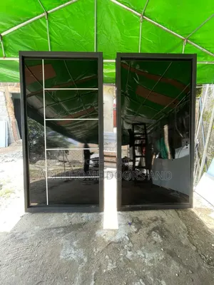 Local Made Pivot Door 4f.t by 8f.t Plain Black and Silver Line Black