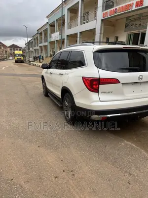 Honda Pilot Touring 4dr SUV 4WD (3.5L 6cyl 9A) 2016 Off white