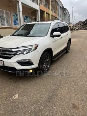 Honda Pilot Touring 4dr SUV 4WD (3.5L 6cyl 9A) 2016 Off white