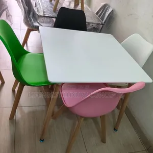 Four Seaters Restaurant/Dinning Table With Four Padded Coloured Chair