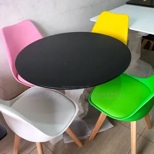 Stylish Round Top Restaurant/ Dinning Table With Four Coloured Chairs