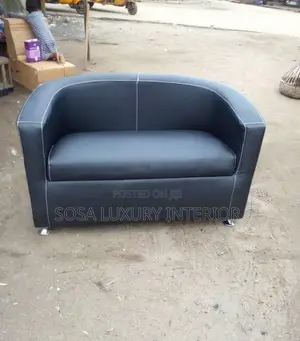 Two Seater Leather Bucket Chair