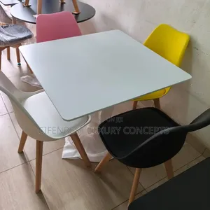 White Top Restaurant Squared Dinning Table With Four Coloured Chairs