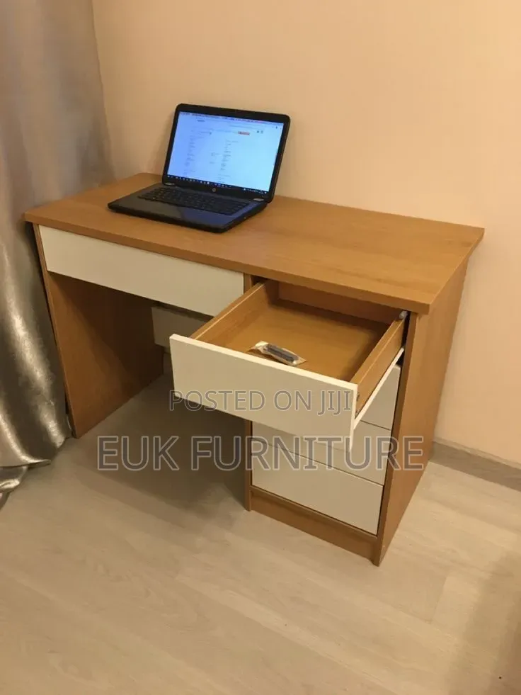 Simple and Classy Table With Four Drawers for Space