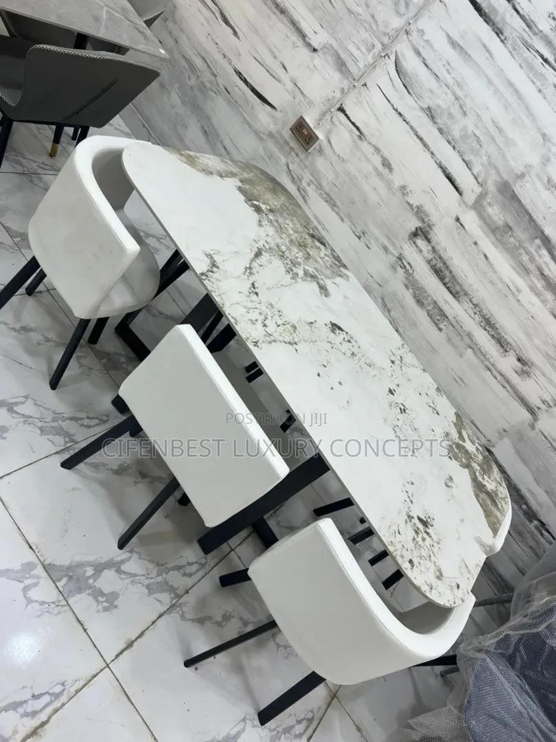 Six Seaters Dinning Table Set With Six Leather Chairs