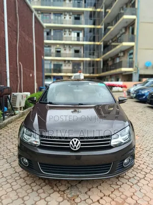 Volkswagen Eos Komfort 2dr Convertible (2.0L 4cyl Turbo 6AM) 2014 Brown