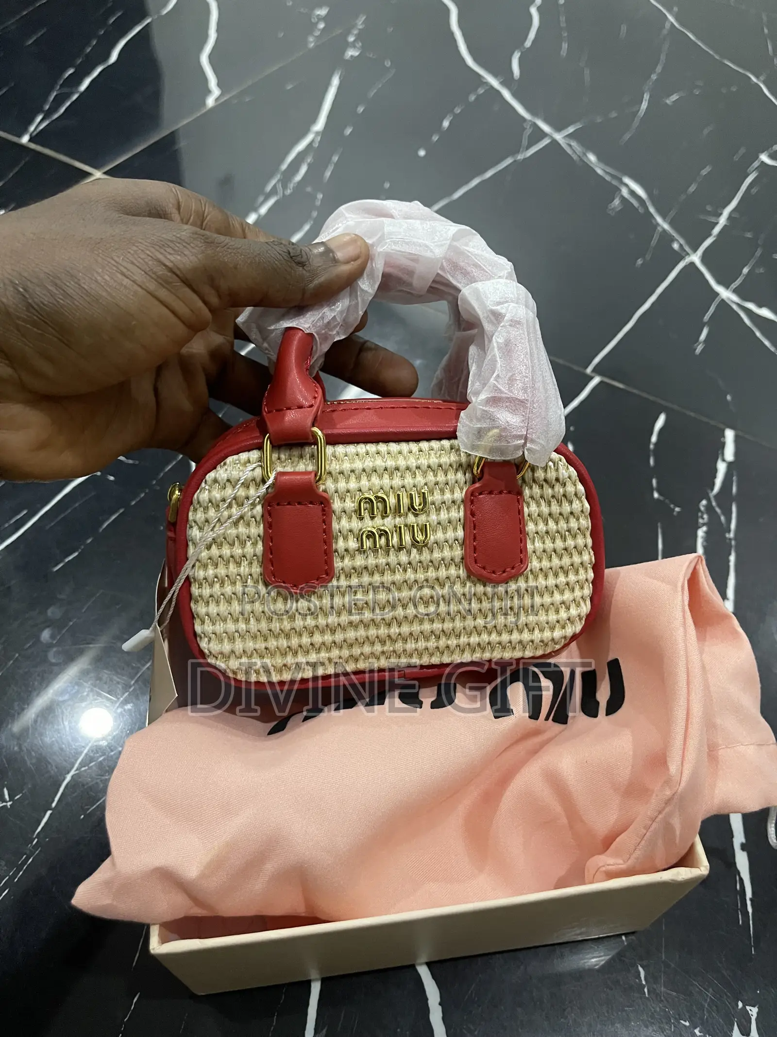 The Miu Miu Micro Duffel - Red Edition