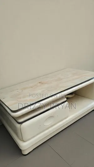 A Detailed Designed Wooden/Marble TV Stand