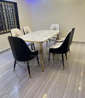 Modern 6-Seater Marble-Top Dining Set Featuring Striking Gold-Finished