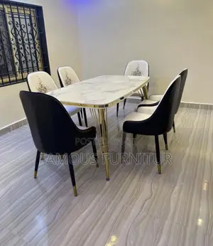 Modern 6-Seater Marble-Top Dining Set Featuring Striking Gold-Finished