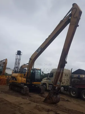 Longboom Cat 320dl