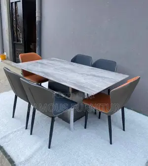 This Is a Modern Rectangular Marble-Top Dining Table
