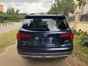 Honda Pilot Touring 4dr SUV 4WD (3.5L 6cyl 9A) 2017 Blue